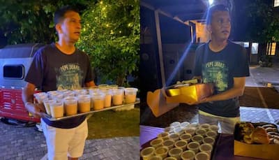 Former Sri Lanka cricketer Roshan Mahanama serves tea, buns to people amid severe fuel crisis in island nation