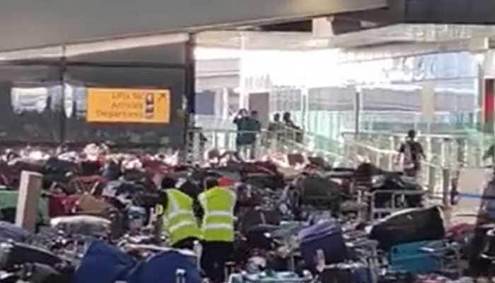 Bags get piled up at London Heathrow Airport due to ‘technical issue’- WATCH