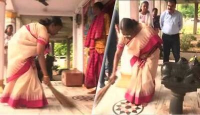 Presidential polls 2022: Draupadi Murmu cleans the temple premises with a broom, offers puja, VIDEO goes viral