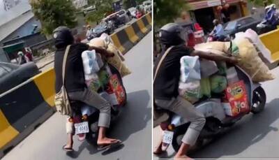 Man rides overloaded scooter, Telangana Police uses viral video to spread road safety awareness