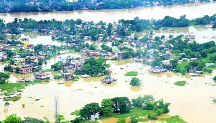 Assam floods: People take shelter on highways as houses remain inundated, over 45.34 lakh affected 