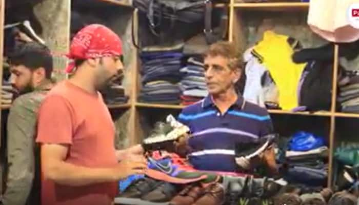 Asad Rauf, former ICC elite umpire caught in sex scandal, now sells shoes in Pakistan