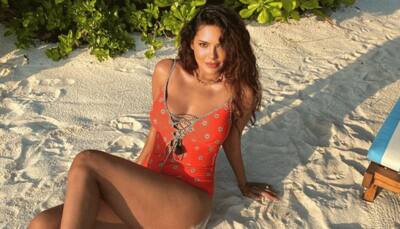 HOTNESS! Esha Gupta breaks internet into storm, flaunts her toned body in sultry orange bikini, check video	