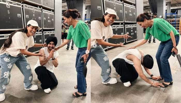 Diljit Dosanjh falls at the feet of YouTuber Lilly Singh&#039;s mom at Toronto concert