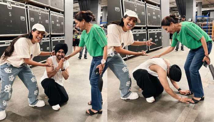 Diljit Dosanjh falls at the feet of YouTuber Lilly Singh's mom at Toronto concert