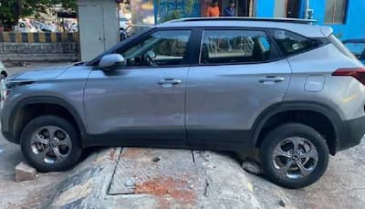 Kia Seltos SUV with high ground clearance gets stuck on a colossal-sized speed breaker, internet reacts