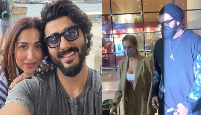 Arjun Kapoor turns protective for girlfriend Malaika Arora as she gets mobbed at Mumbai airport - WATCH!