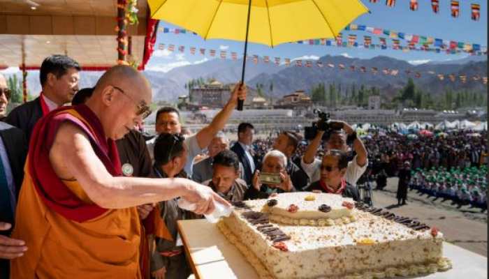 His Holiness the Dalai Lama cutting birthday cake during the celebration of his birthday at Shiwatsel teaching pavilion in Leh, Ladakh.