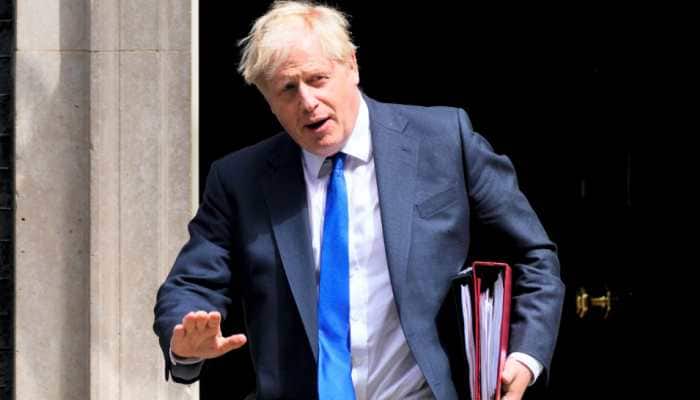 'I will not resign', says Boris Johnson as over 30 British lawmakers quit