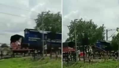 Train colliding with truck captured on camera at a railway crossing in Karnataka: WATCH