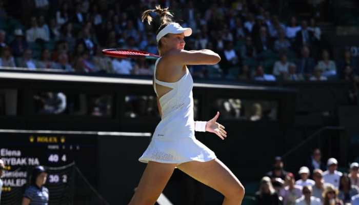 Wimbledon 2022 Elena Rybakina thrashes Simona Halep to reach her first Grand Slam final Tennis News Zee News