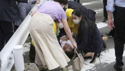 Former Japanese PM Shinzo Abe shot at during speech, collapses on stage