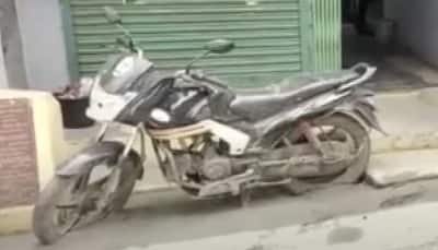 Tamil Nadu man’s bike stuck in concrete as new road laid around it: Watch video