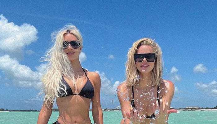 Kim Kardashian and sister Khloe Kardashian twin in black bikinis, get a &#039;wow&#039; from fans!