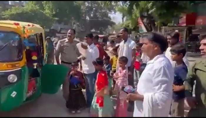 Auto Rickshaw with 3 seats filled with 26 passengers leaves policemen scratching heads