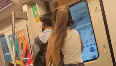 Watch: 'Tere jaisa ladka kisi ko na mile...' Girl-boy get into fist fight on Delhi Metro over T-shirt price!
