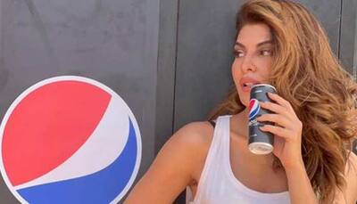 Jacqueline Fernandez oozes oomph in ripped denim shorts with Pepsi in hand - See photos from her latest ad