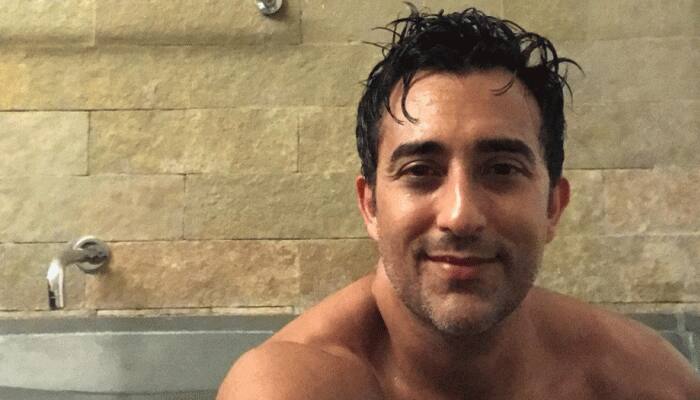 Vinod Khanna&#039;s son Rahul Khanna poses almost naked, hides modesty with cushion: VIRAL pic