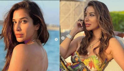 Sophie Choudry performs yoga in ocean in HOT pink bikini, check out her gorgeous pic