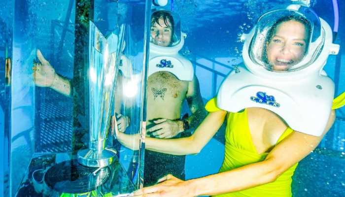 Australia spinner Adam Zampa takes T20 World Cup trophy underwater, see VIRAL pics