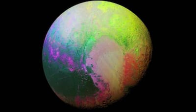 NASA shares stunning rainbow coloured image of Pluto, leaves internet amazed - See pic