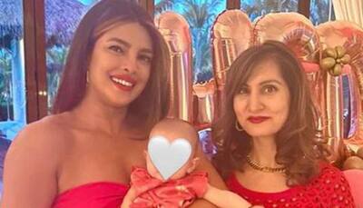 Priyanka Chopra holds daughter Malti Marie close to her heart, mommy and baby girl go twinning in red, see viral pic!