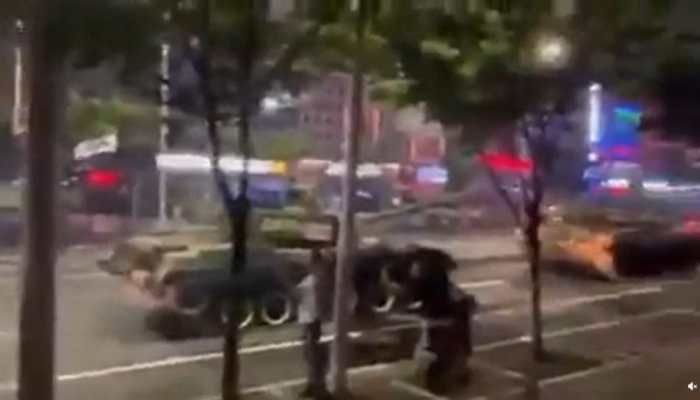 Shocking! Tanks surround crisis-hit banks in China to scare protestors: Watch 