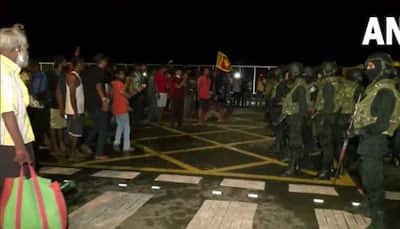 Sri Lankan security personnel dismantle protest camps outside Presidential Secretariat in Colombo amid late-night clampdown 