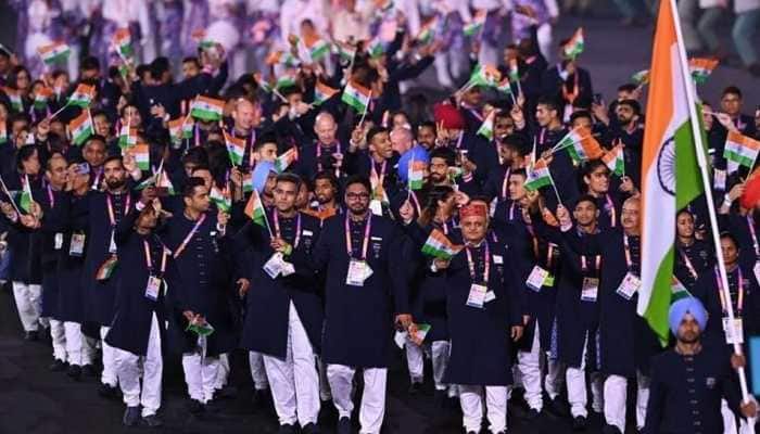Indian contingent arrives during the nations parade with hockey captain Manpreet Singh carrying the flag at the Commonwealth Games 2022 opening ceremony. (Source: Twitter)