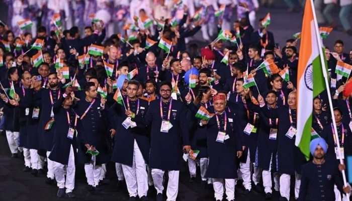 Indian contingent arrives during the nations parade with hockey captain Manpreet Singh carrying the flag at the Commonwealth Games 2022 opening ceremony. (Source: Twitter)