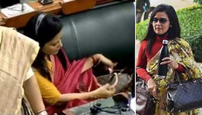 A video of TMC MP Mahua Moitra hiding her Louis Vuitton bag under