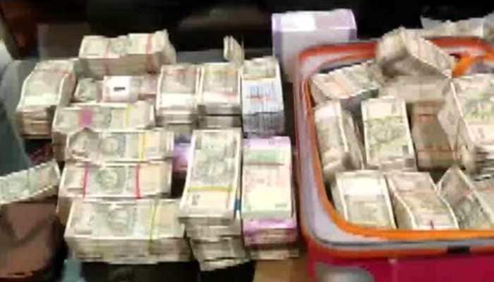 Rs 85 lakh found at clerk&#039;s residence in MP; he consumes poison during search