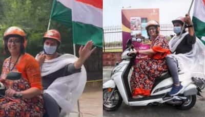 Smriti Irani rides scooter to work after Tiranga yatra, netizens amazed to see ‘Tulsi with Tiranga’ - WATCH
