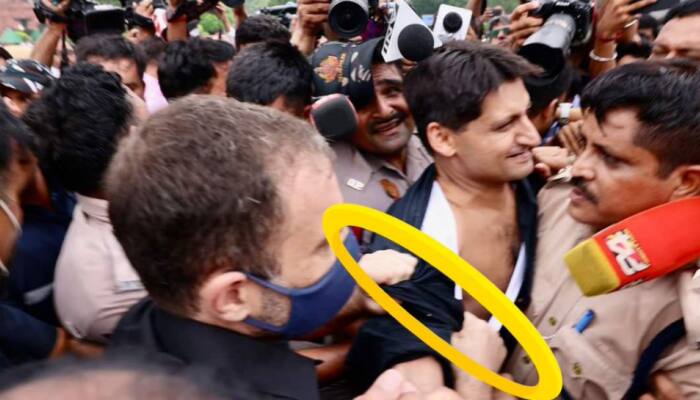 Rahul Gandhi rip a Cong leader&#039;s shirt to hype things? Check BJP&#039;s Picture proof