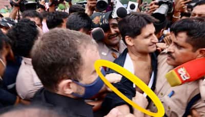 Rahul Gandhi rip a Cong leader's shirt to hype things? Check BJP's Picture proof
