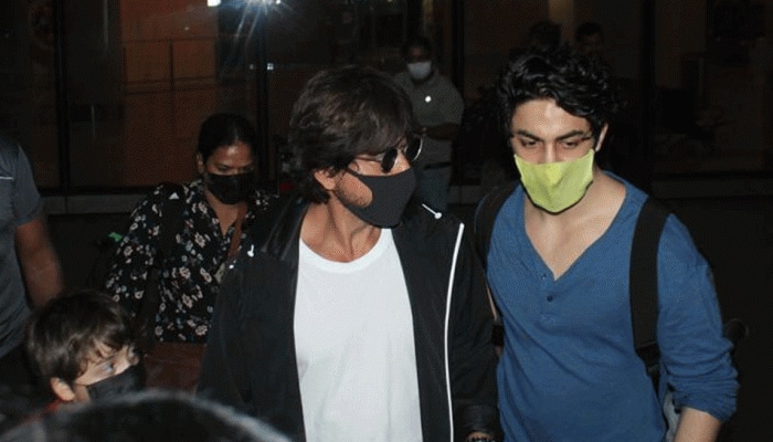 SRK gets angry after fan forcefully touches him, son Aryan cools him down