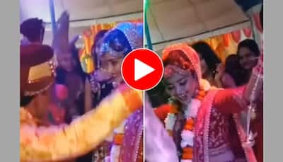 Viral video: Bhojpuri songs make shy bride dance like never before, groom is shocked! - Watch 