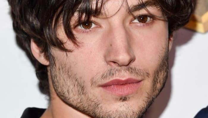 ‘The Flash’ actor Ezra Miller charged with burglary for allegedly stealing alcohol bottles