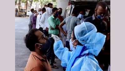 India sees dip in daily Covid-19 cases, reports 14,092 new infections
