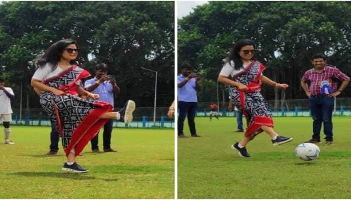 Mahua Maitra DRIBBLING with a football, holding her SAREE in one hand - PICS