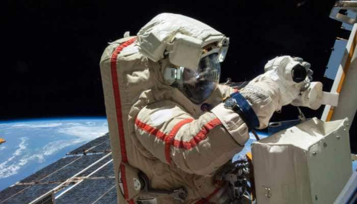 Russian cosmonauts' spacewalk cut short due to 'bad battery' in spacesuit