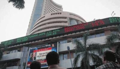 Markets settle with modest gains in highly volatile trade