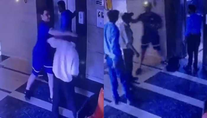 Gurugram man arrested for slapping, abusing security guard, another person  over getting stuck in lift - WATCH | India News | Zee News