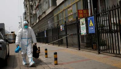 China's big cities impose Covid-19 lockdowns, tougher curbs to stamp out fresh outbreaks