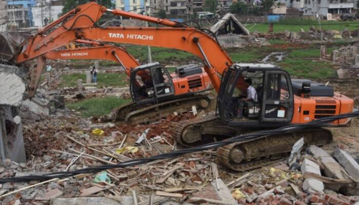 Yogi Adityanath's bulldozer razes shops outside Akhilesh Yadav's Samajwadi Party office in Lucknow