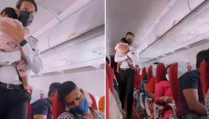 WATCH: Air India flight attendant handles crying baby like a PRO, joyous father approves Tata Group’s takeover