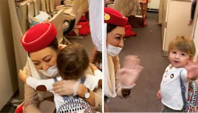 WATCH: Video of Air Hostess welcoming toddler son onboard Emirates flight goes VIRAL