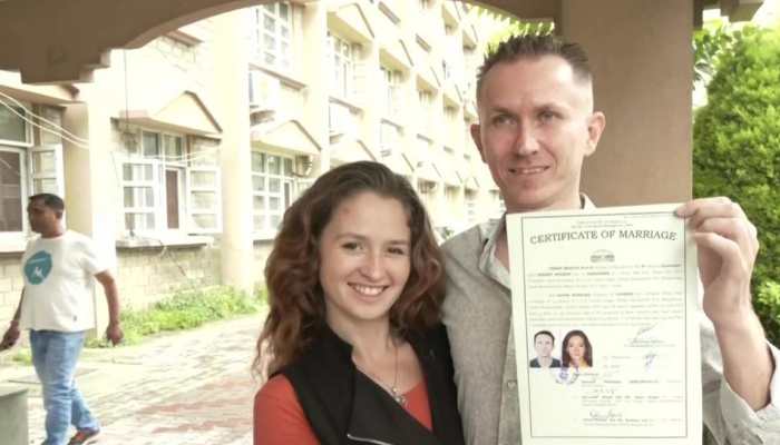 Russian-born man, Ukrainian woman get married in Dharamshala, urge the two nations to &#039;make love, not war&#039;