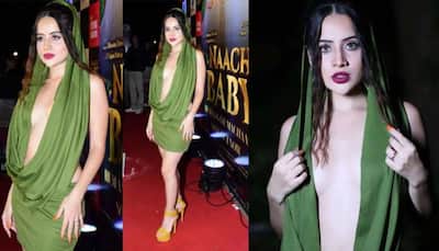 Urfi Javed ditches her bra in THIS backless short dress, lashes out at media for commenting on her 'kapde' - Watch