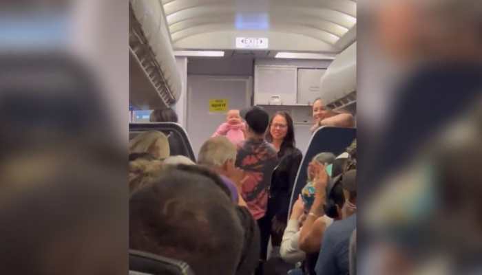 Baby on flight stops breathing mid-air, retired nurse rescues infant just in time: Watch video